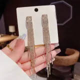 눈부신 웨이브 골드 샹들리에 드롭 귀걸이